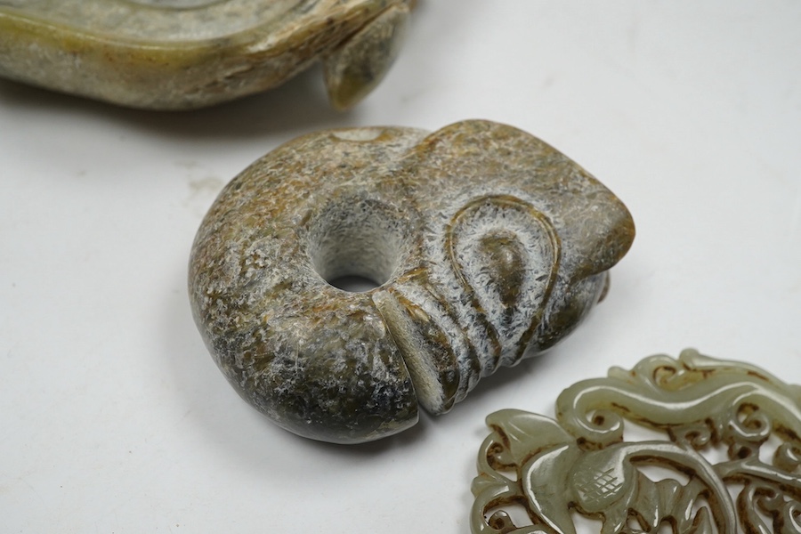 A 19th century Chinese reticulated celadon jade disc, 6.5cm diameter, a Ming style peach shaped brushwasher and a neolithic style carving. Condition - good